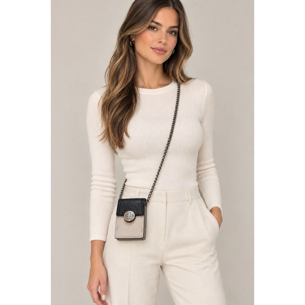 Brighton Ferrara crossbody and phone organizer black and cream chain strap